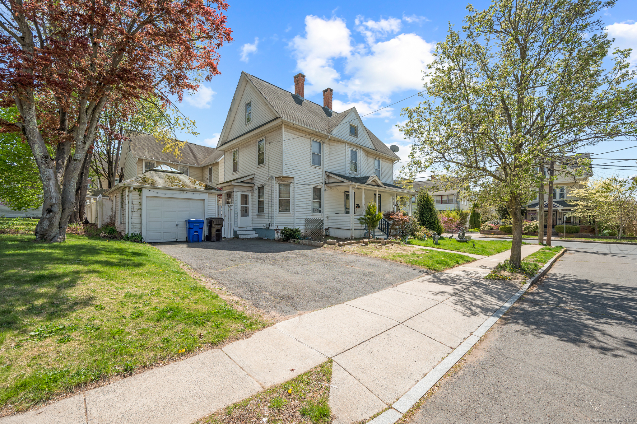 175 Lincoln Street Middletown, CT 06457 - Photo 28 of 33 a view of a house with a yard and large tree