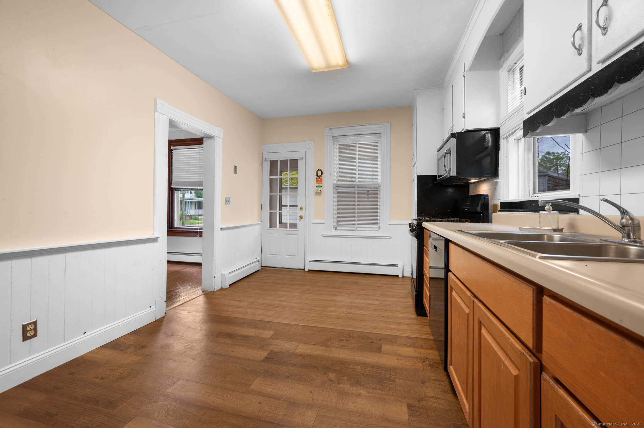 175 Lincoln Street Middletown, CT 06457 - Photo 7 of 33 a kitchen with granite countertop a sink stove and refrigerator
