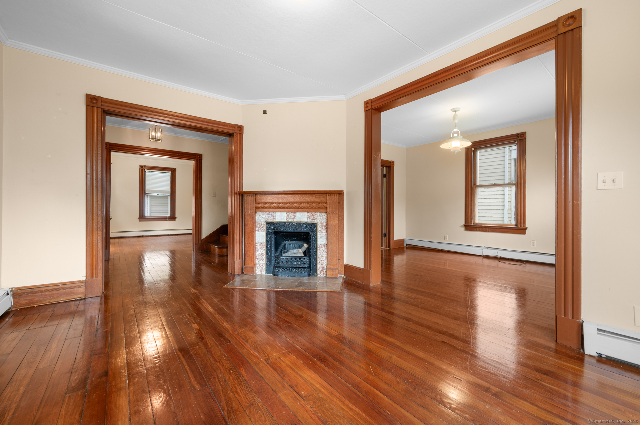 175 Lincoln Street Middletown, CT 06457 - Photo 8 of 33 a view of an empty room with wooden floor and a window