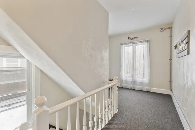 a view of an entryway with stairs