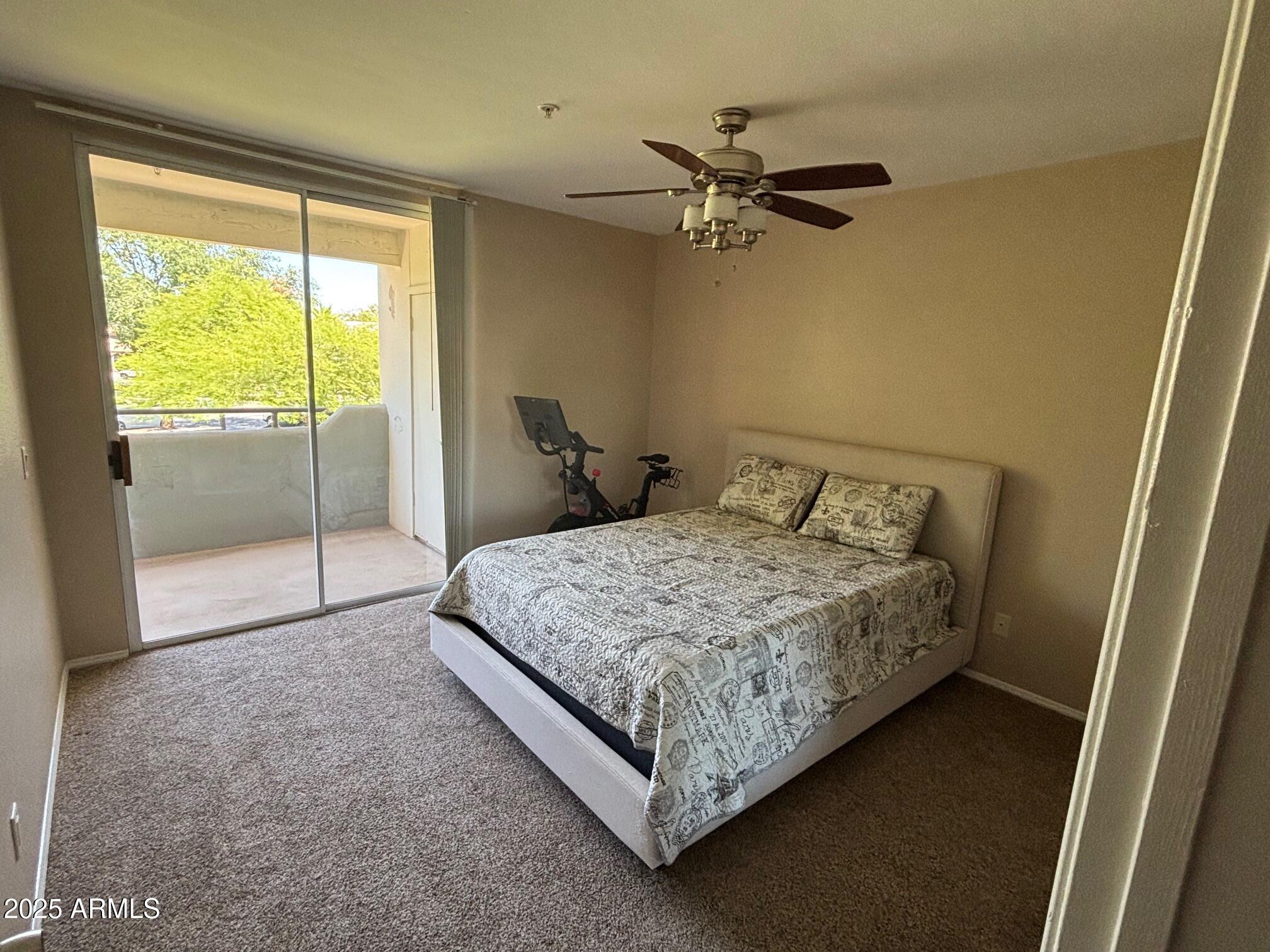 1825 West Ray Road, Unit 2082 Chandler, AZ 85224 - Photo 14 of 37 a bedroom with a bed and window
