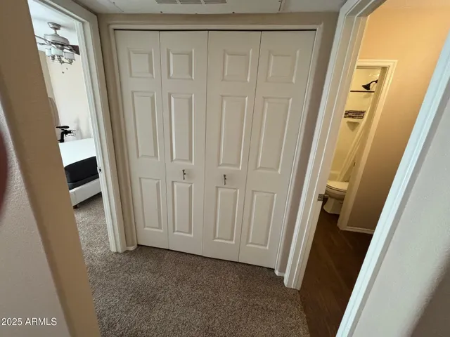 a view of a closet in a door