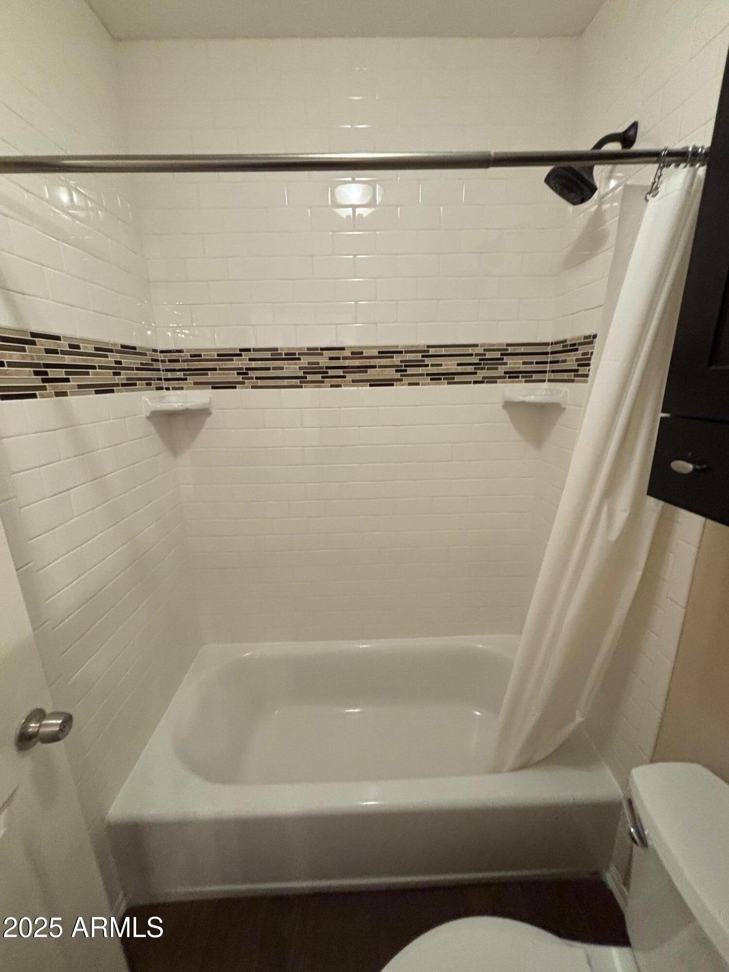 1825 West Ray Road, Unit 2082 Chandler, AZ 85224 - Photo 23 of 37 a close view of a bathtub in bathroom