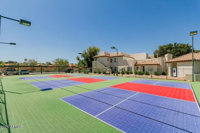 a view of park with tall trees
