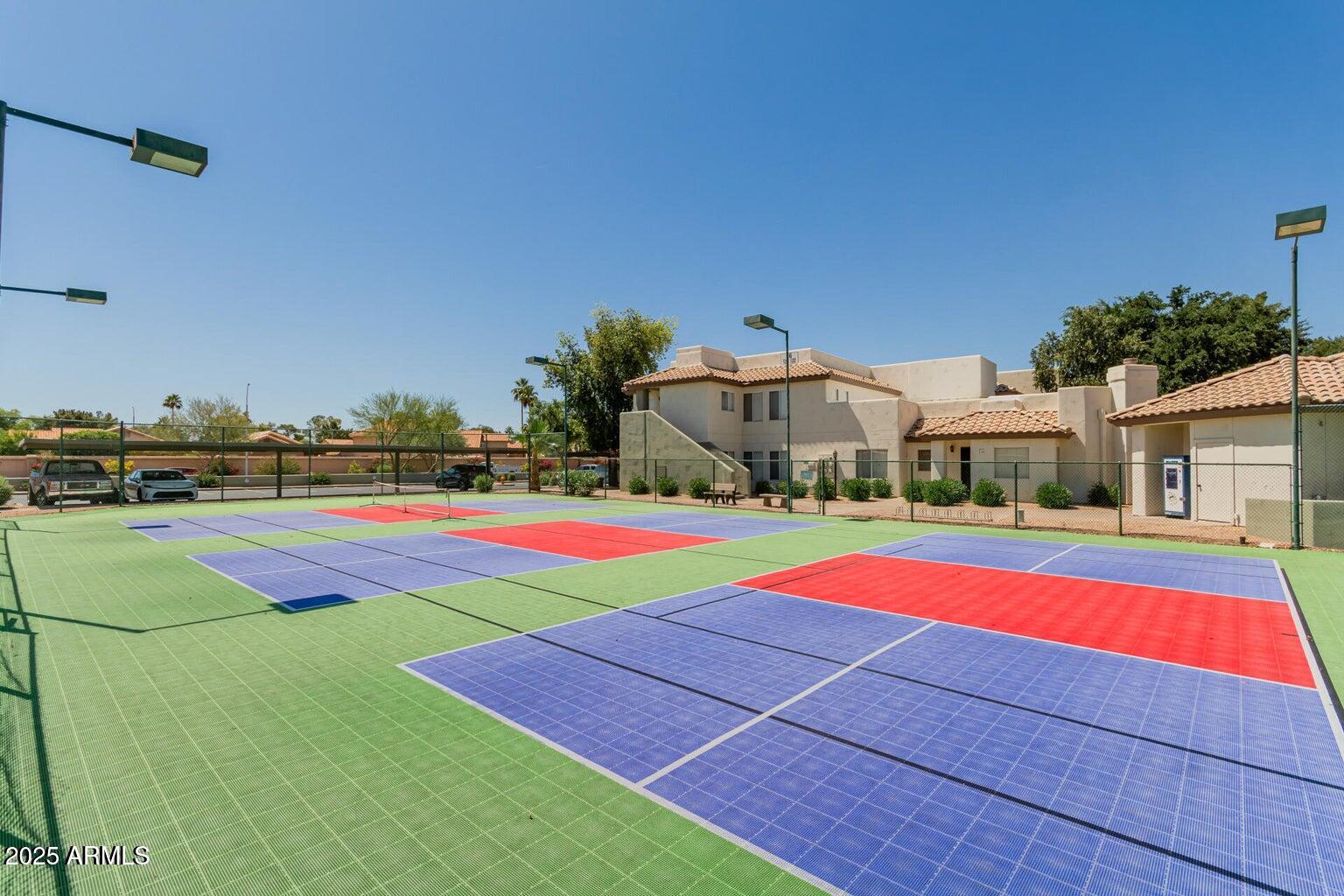 1825 West Ray Road, Unit 2082 Chandler, AZ 85224 - Photo 25 of 37 a view of an outdoor space with pool and yard