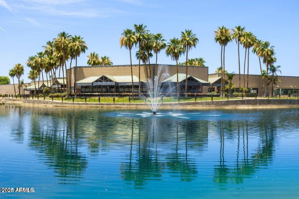 1825 West Ray Road, Unit 2082 Chandler, AZ 85224 - Photo 30 of 37 a view of a lake with houses