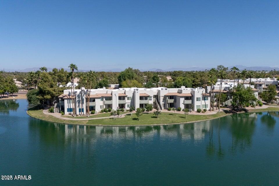 1825 West Ray Road, Unit 2082 Chandler, AZ 85224 - Photo 34 of 37 a view of residential houses with outdoor space lake and city view