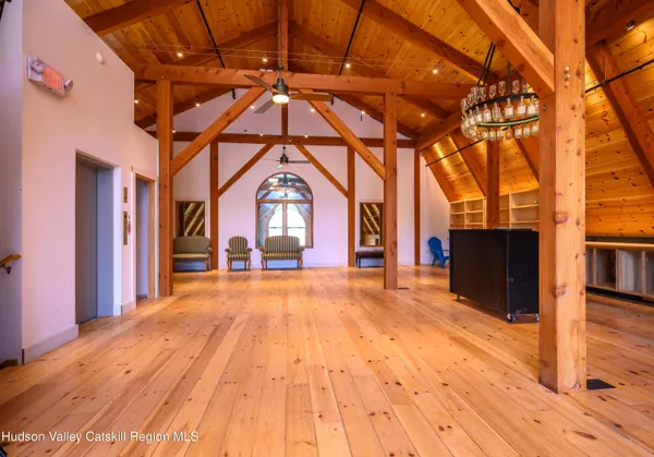 a view of an empty room with racks on the wall