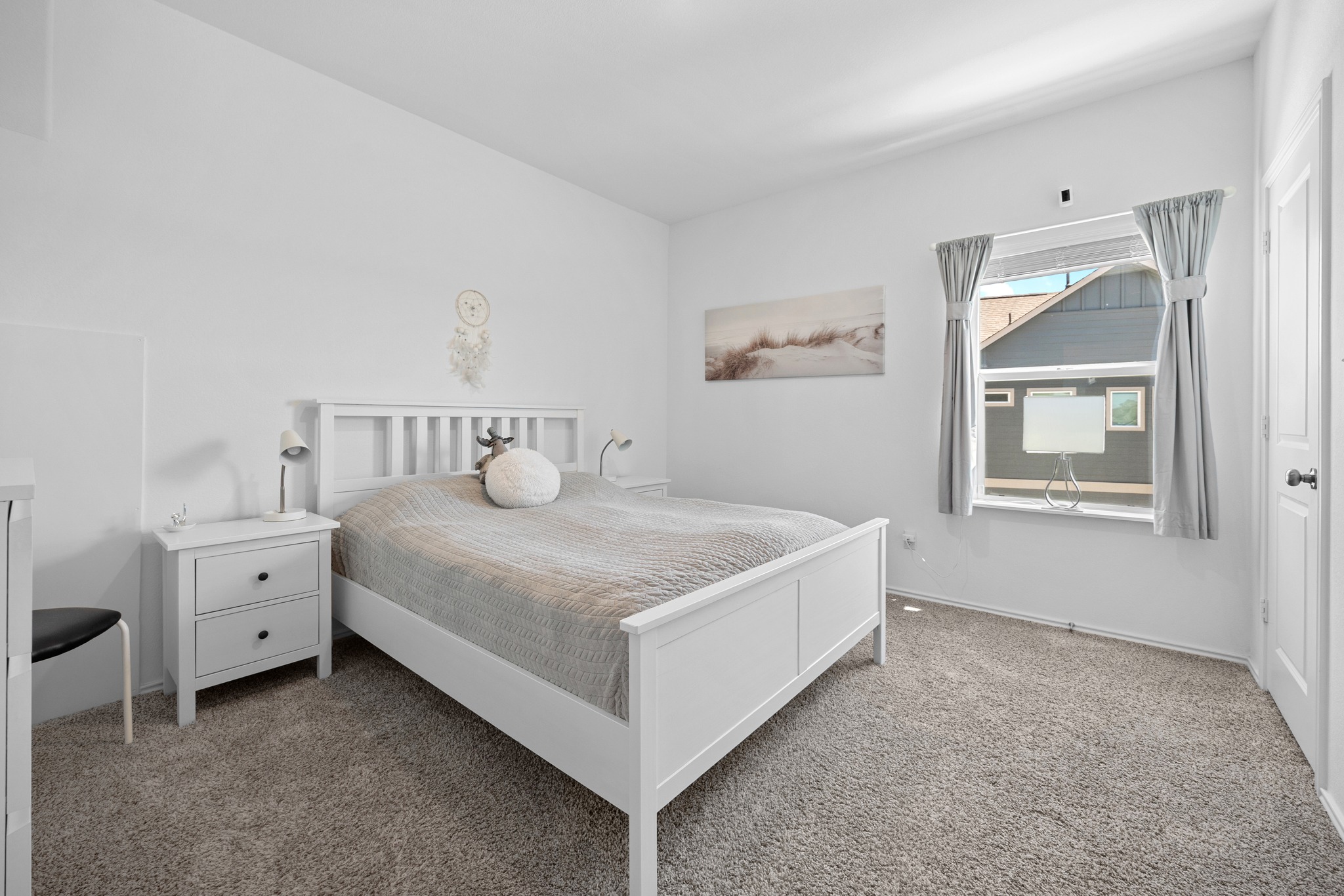 1500 Linwood Street Leander, TX 78641 - Photo 20 of 38 a bedroom with a bed and a window