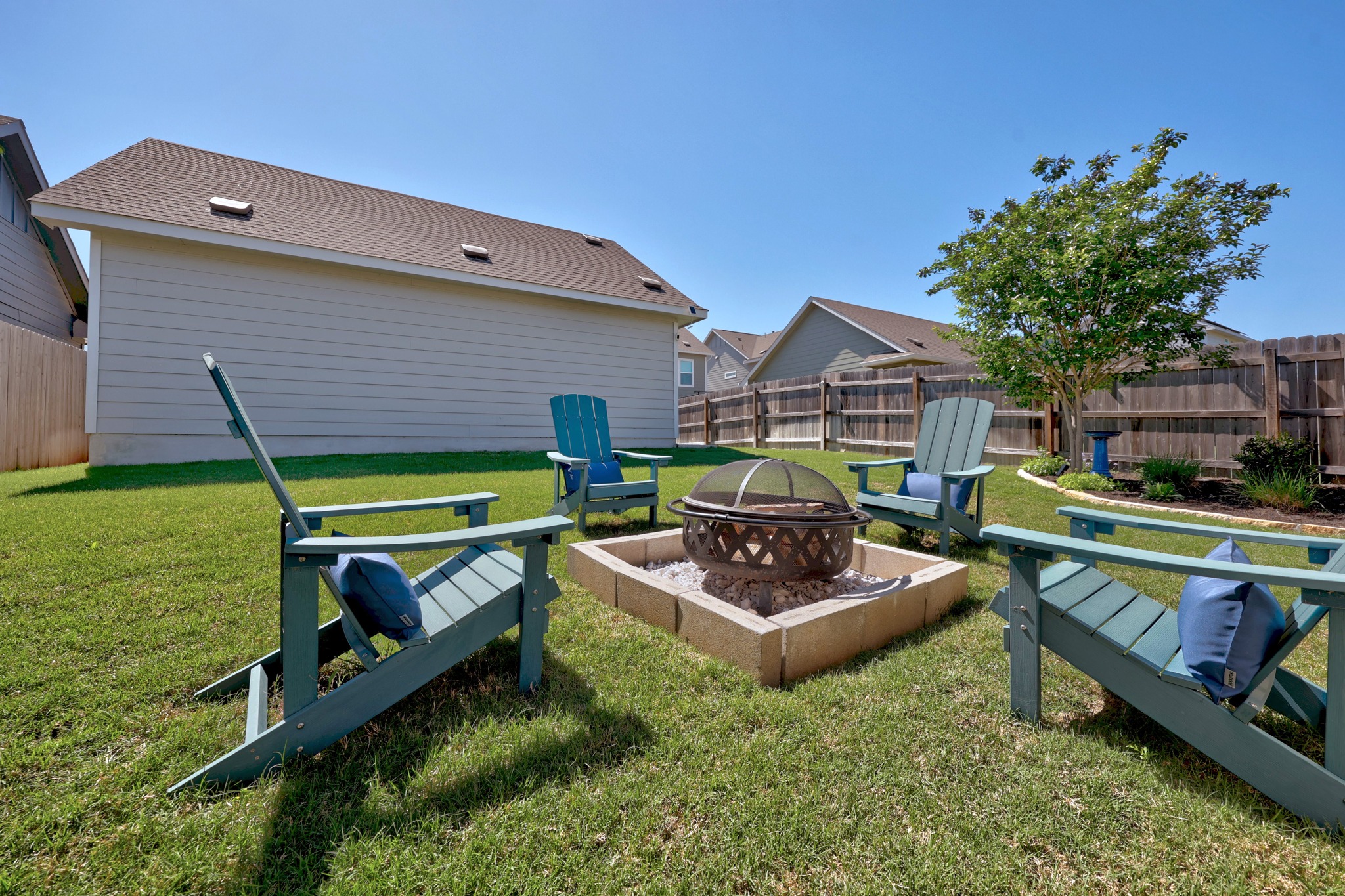 1500 Linwood Street Leander, TX 78641 - Photo 32 of 38 a view of an chairs and table in a patio