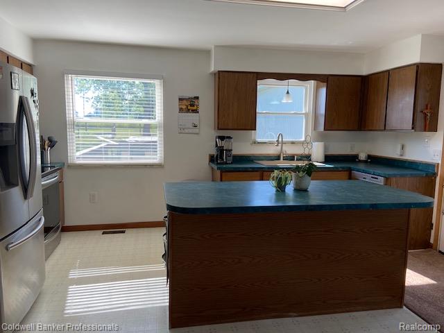 4615 5 Lakes Road North Branch, MI 48461 - Photo 8 of 27 Kitchen featuring a central island