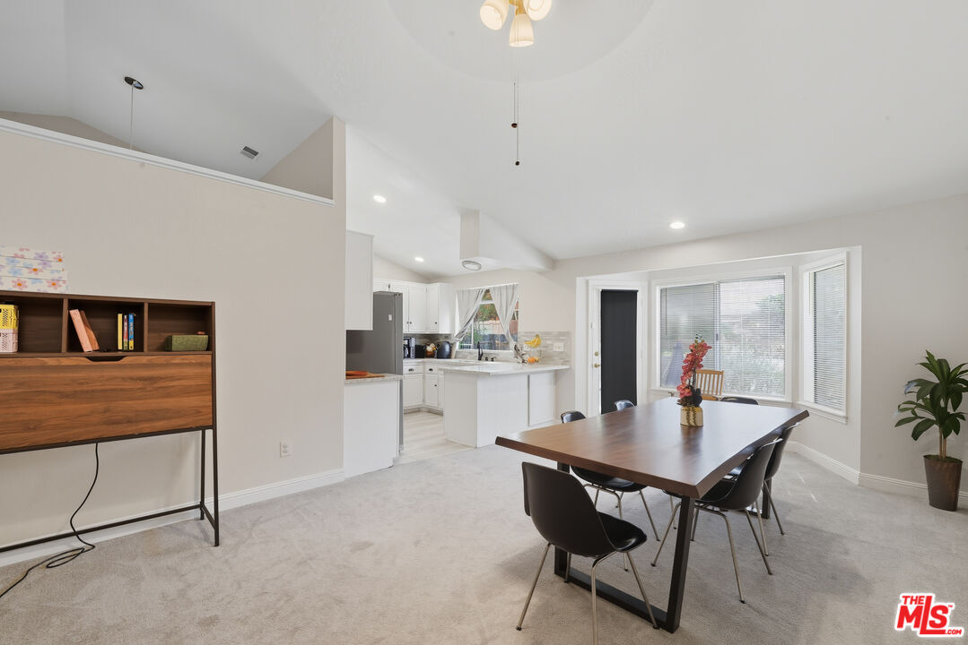 2048 East Ave R 10 Palmdale, CA 93550 - Photo 22 of 45 a view of a dining room with furniture
