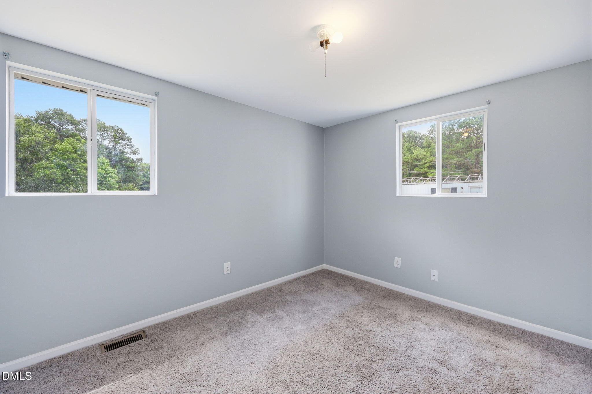 1758 Barber Mill Road Clayton, NC 27520 - Photo 15 of 41 an empty room with a window