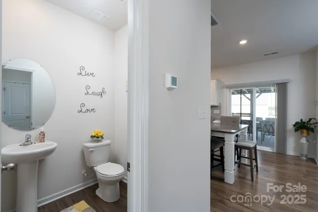a bathroom with a sink toilet and tub