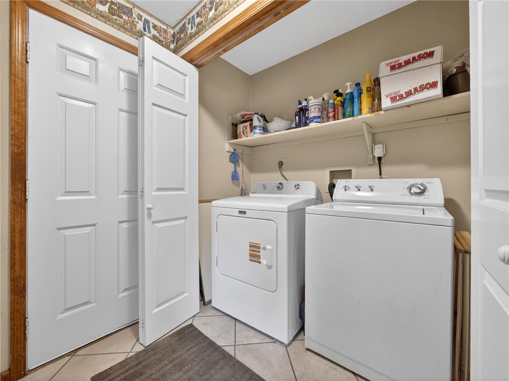 853 Lahr Road Nazareth, PA 18064 - Photo 13 of 29 Functional laundry space featuring a washer, dryer, and convenient shelving.