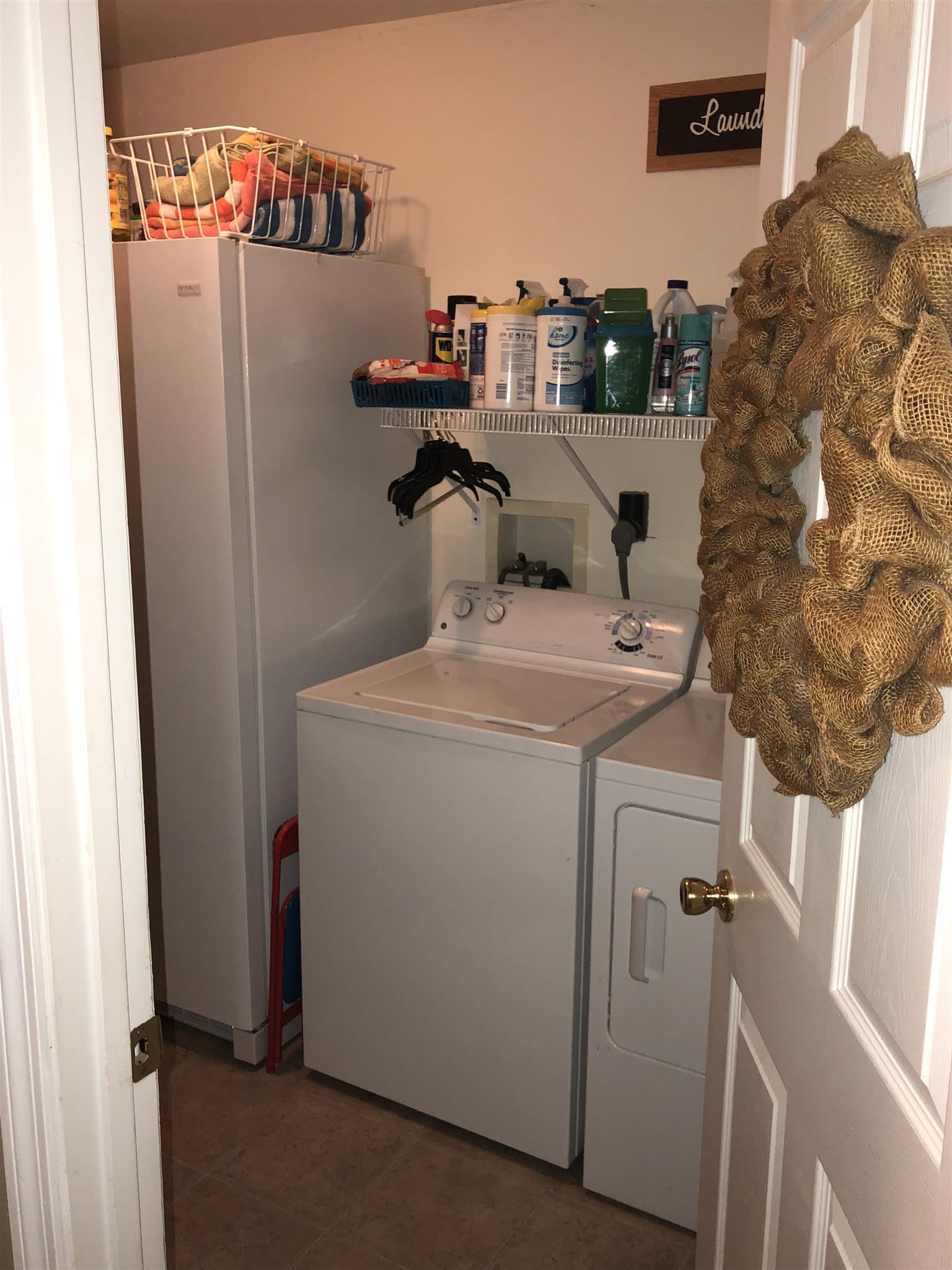 1087 Jackson Heights Road Goodlettsville, TN 37072 - Photo 11 of 23 a utility room with dryer and washer