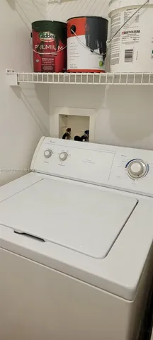 a utility room with washer and dryer