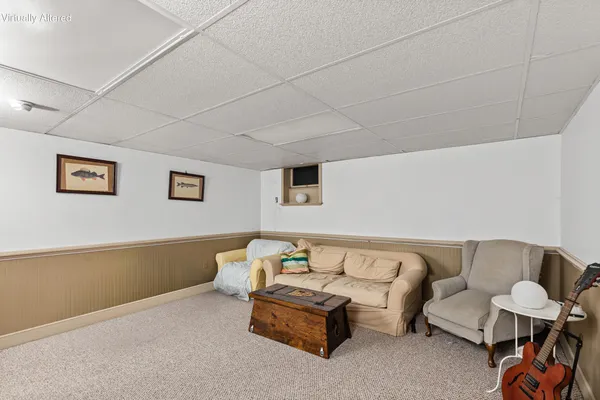 a living room with furniture and a couch
