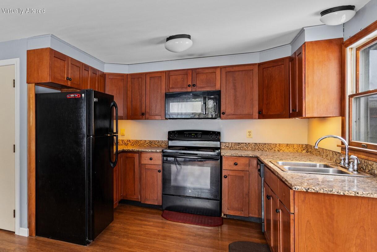 600 Kingsbury Beach Road Eastham, MA 02642 - Photo 15 of 29 a kitchen with granite countertop a refrigerator stove and sink