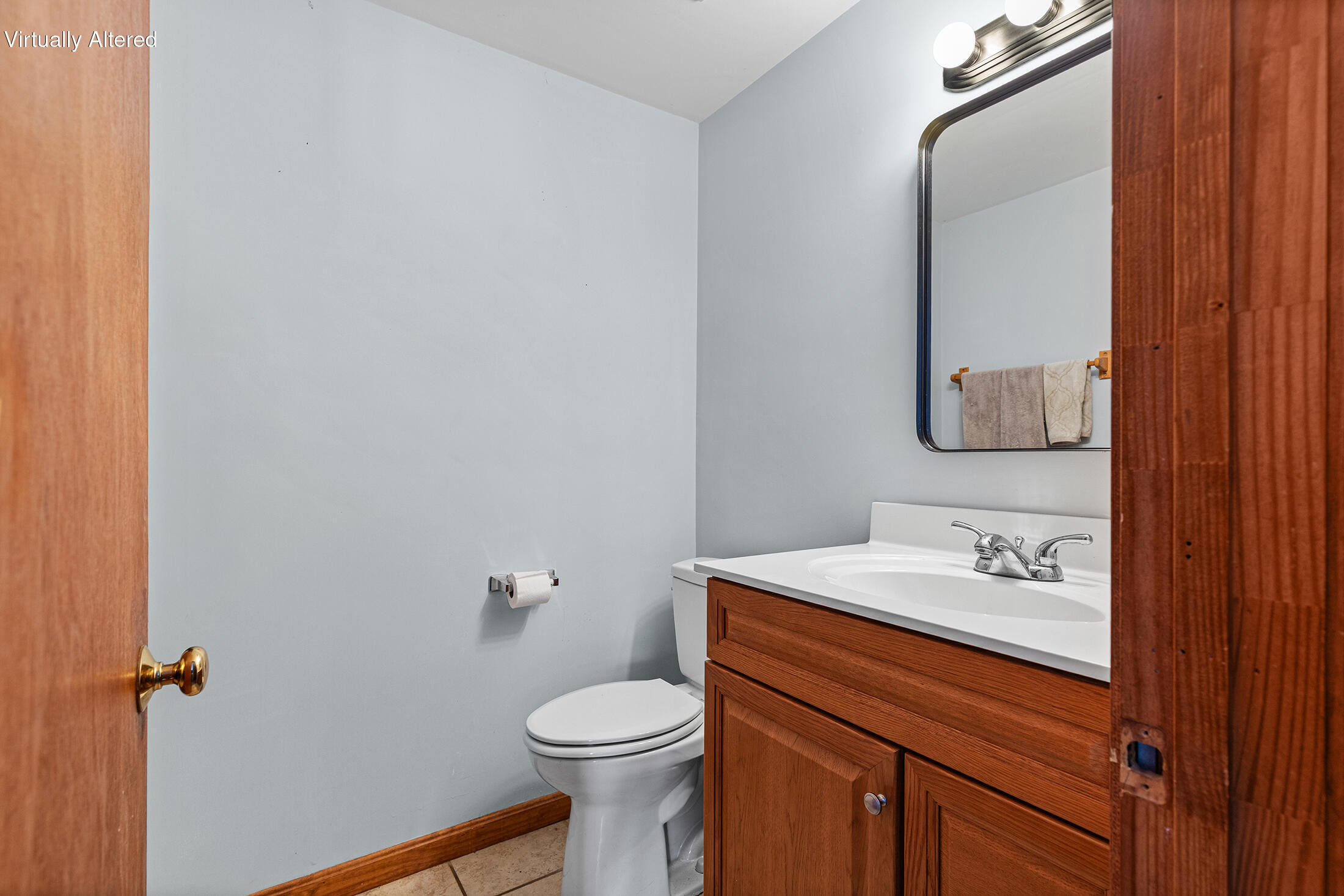 600 Kingsbury Beach Road Eastham, MA 02642 - Photo 21 of 29 a bathroom with a sink vanity mirror and toilet