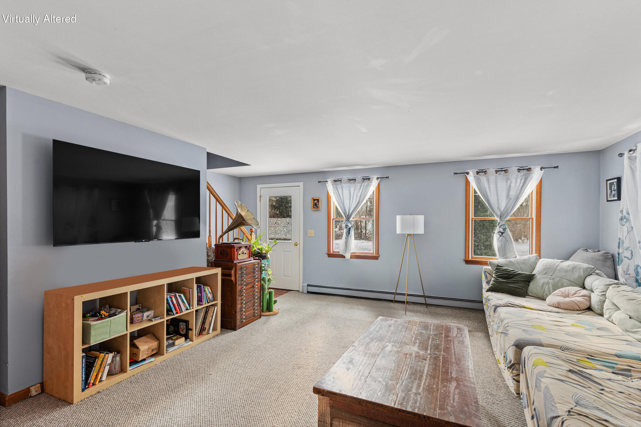 600 Kingsbury Beach Road Eastham, MA 02642 - Photo 8 of 29 a living room with furniture and a flat screen tv