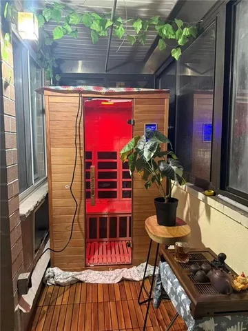 a outdoor dining space with chairs and a fireplace