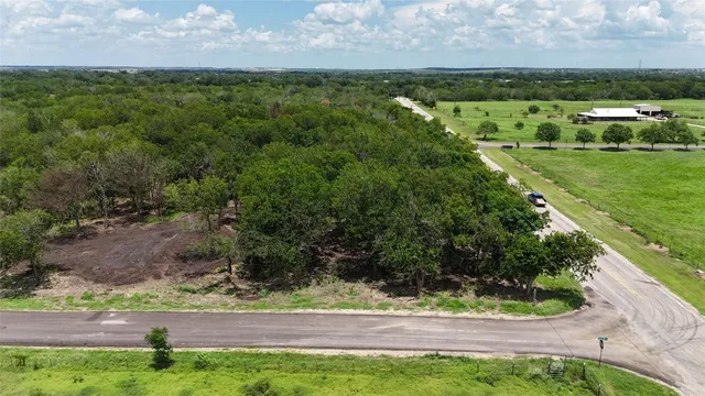 a view of a yard with an outdoor space