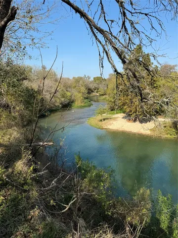 a view of a backyard of a house