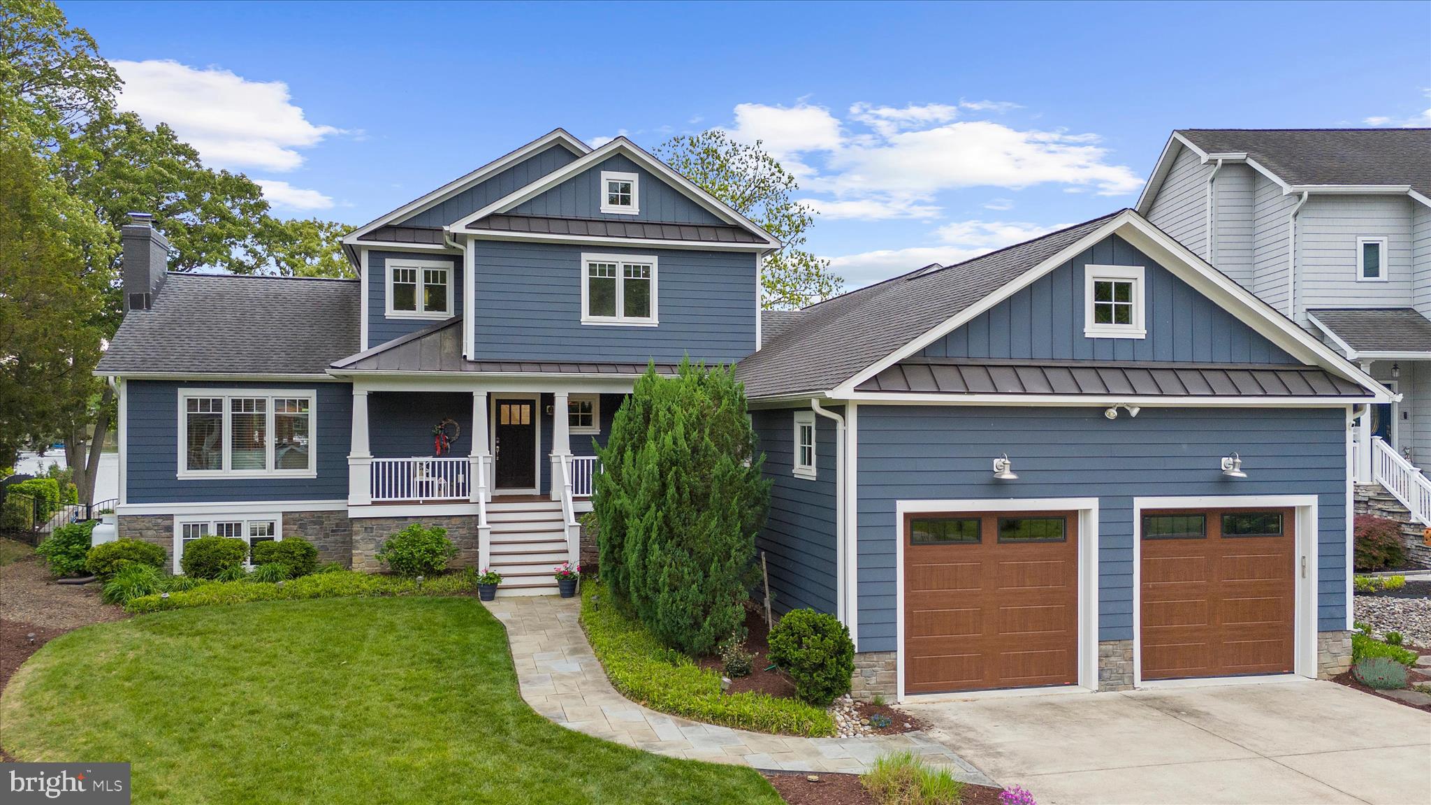 3815 Outrigger Drive Edgewater, MD 21037 - Photo 106 of 114 a front view of a house with a yard
