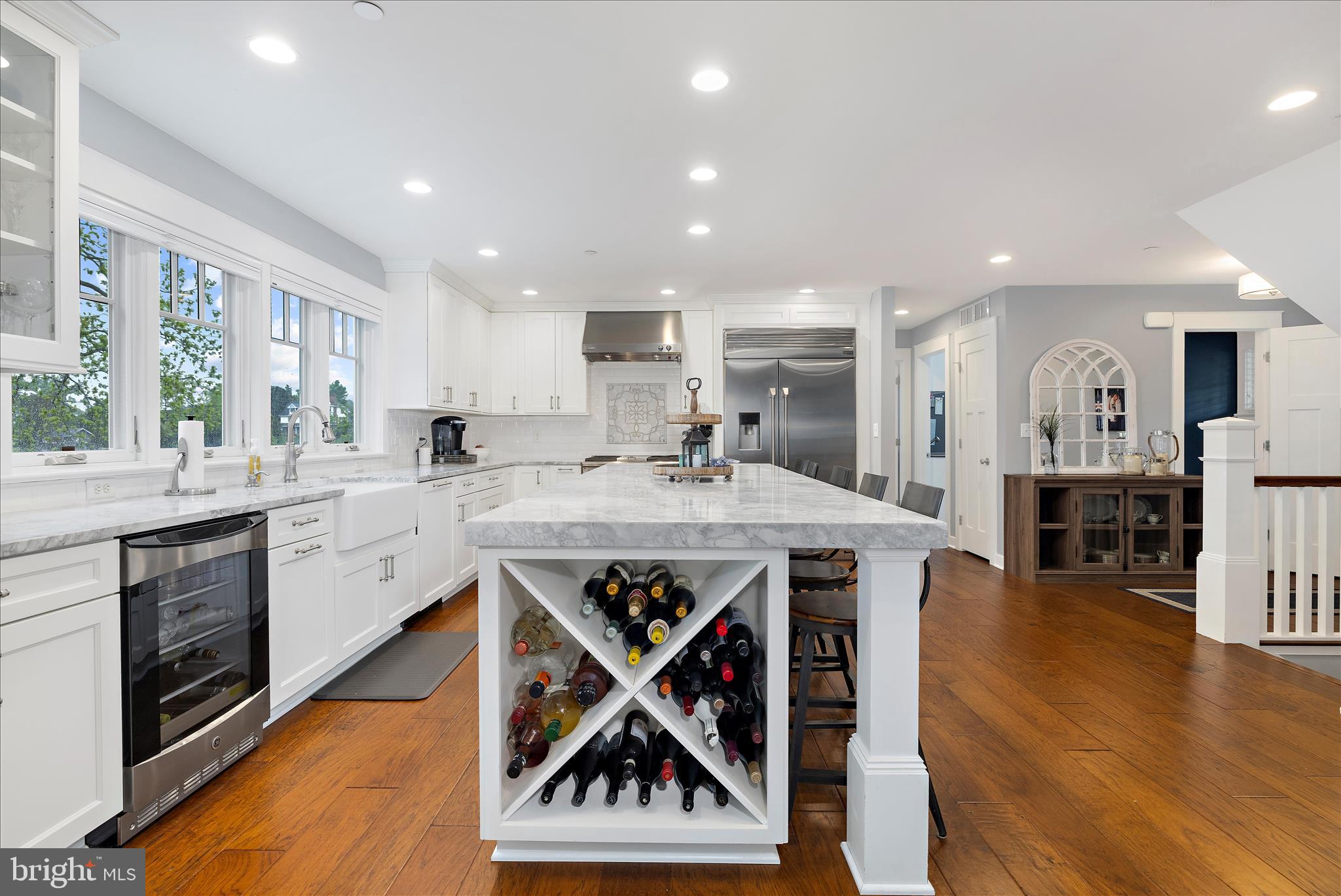 3815 Outrigger Drive Edgewater, MD 21037 - Photo 12 of 114 a kitchen with stainless steel appliances granite countertop a kitchen island a stove and a sink