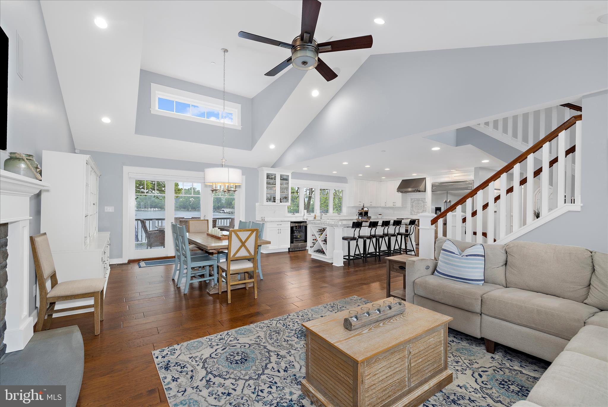 3815 Outrigger Drive Edgewater, MD 21037 - Photo 20 of 114 a living room with furniture and a dining table with wooden floor