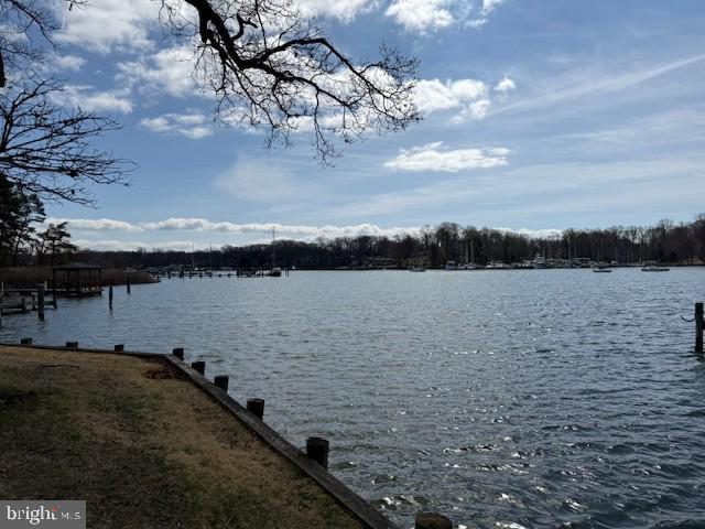 3815 Outrigger Drive Edgewater, MD 21037 - Photo 6 of 7 Serene lakeside view under blue skies.