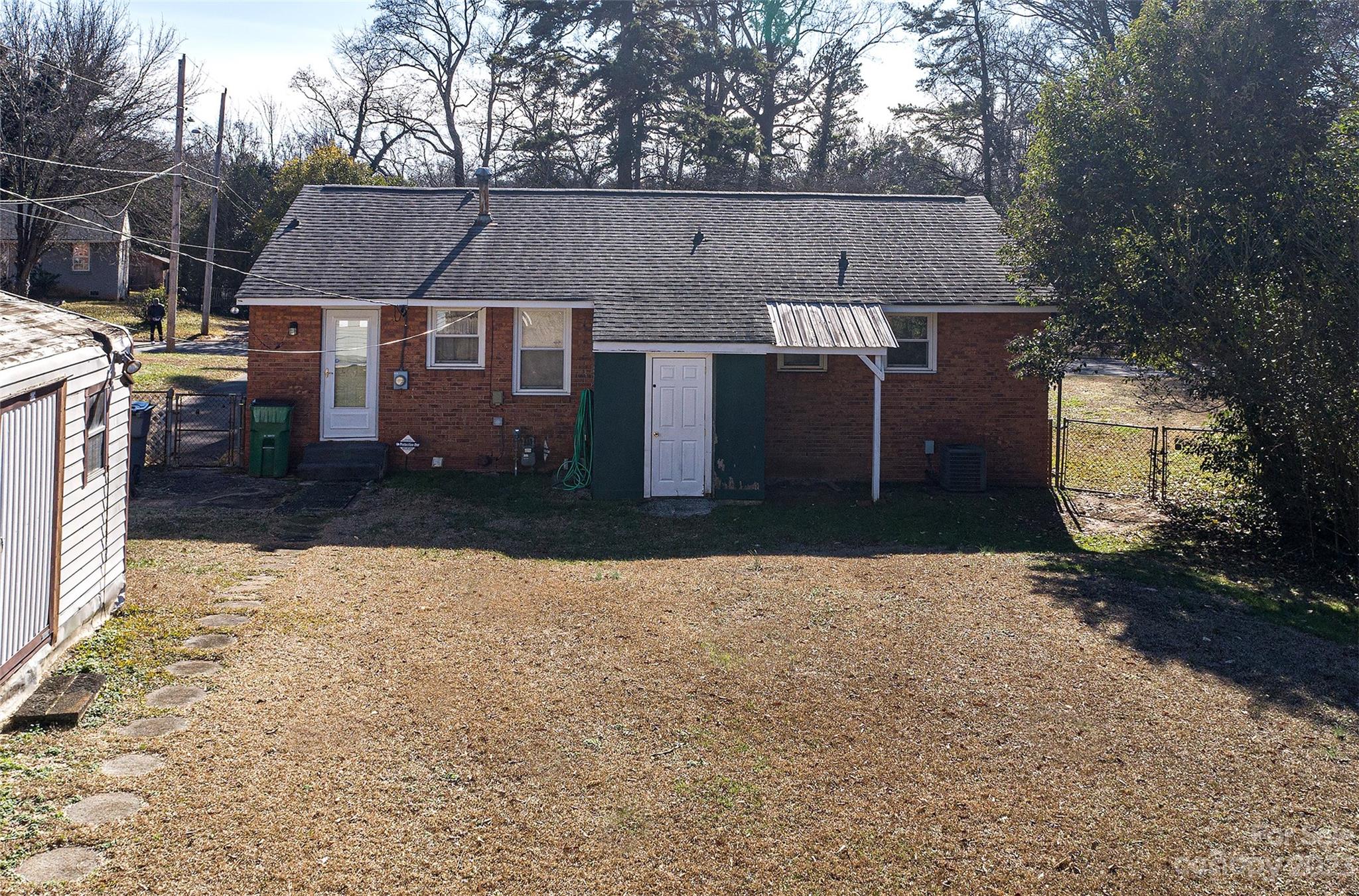 5116 Grapevine Drive Charlotte, NC 28217 - Photo 14 of 14 a view of house with a yard
