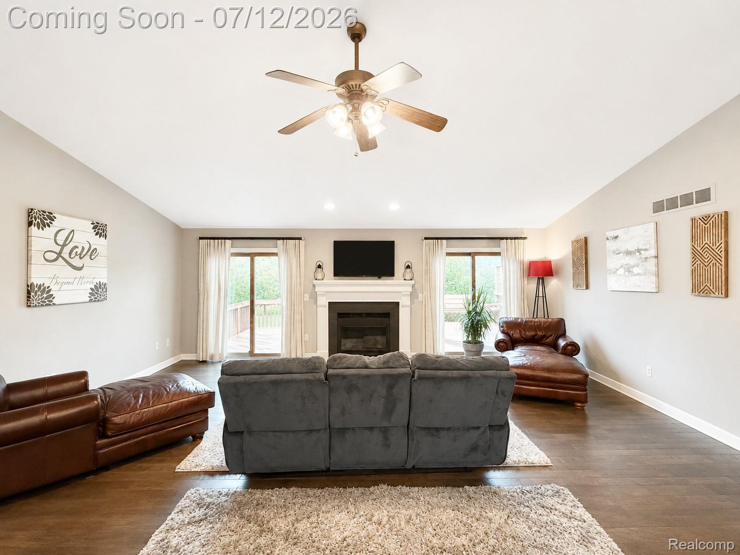2033 Avonstoke Road Rochester, MI 48307 - Photo 7 of 26 Spacious living area featuring wood-finish flooring, a ceiling fan, and recessed lighting