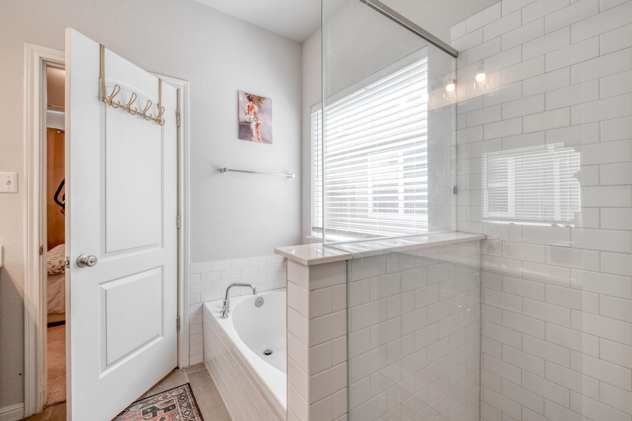 19425 Forman Drive Pflugerville, TX 78660 - Photo 14 of 25 Ensuite bathroom with a bath