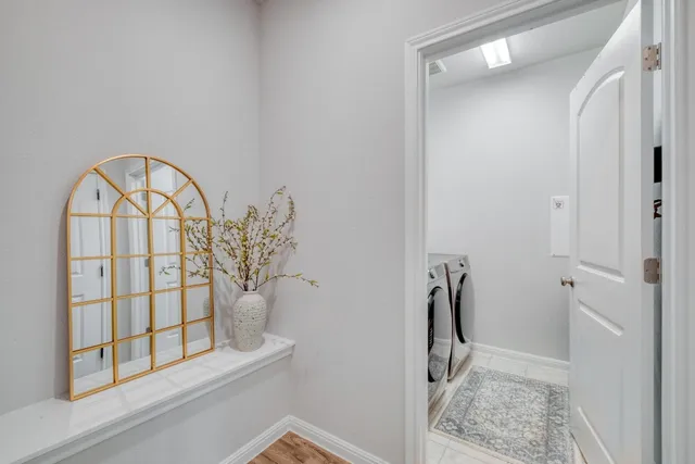 a utility room with dryer and washer