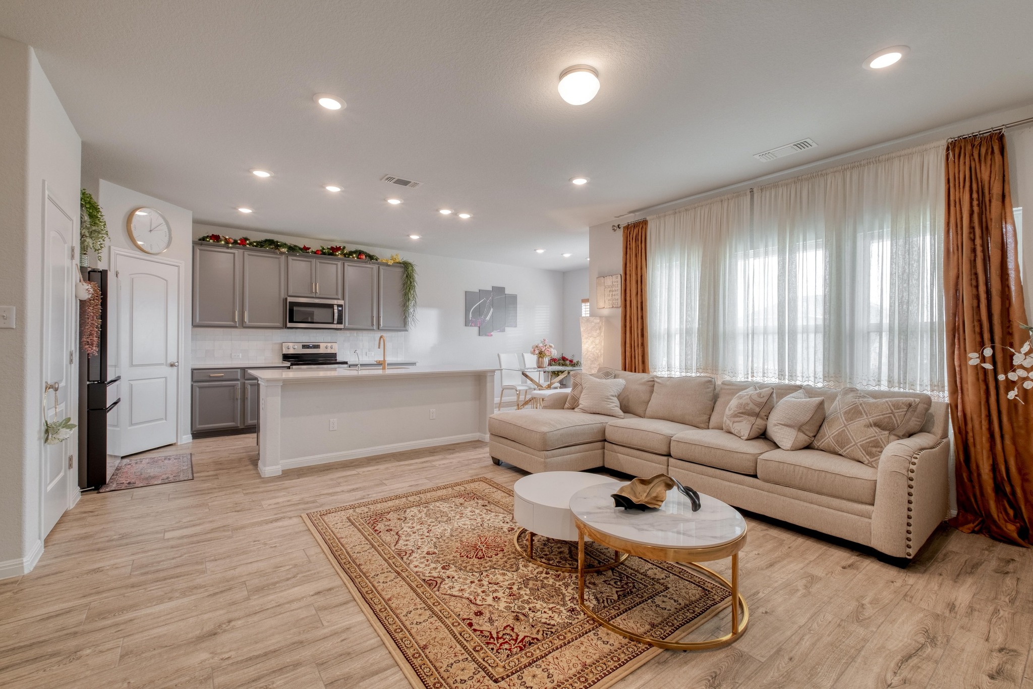 19425 Forman Drive Pflugerville, TX 78660 - Photo 2 of 25 Living room with light wood finished floors and recessed lighting