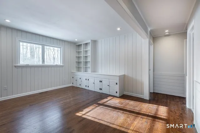 a view of an empty room and window