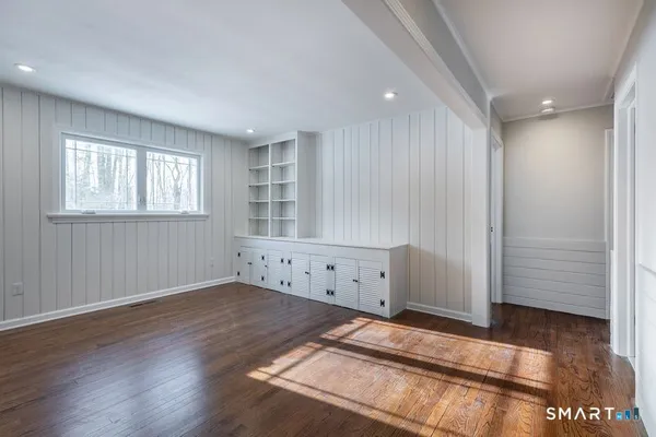 a view of an empty room and window
