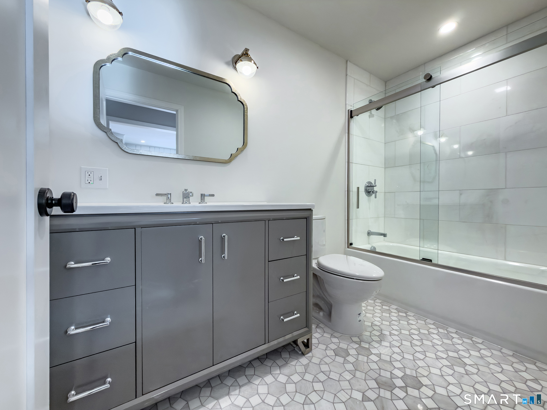 102 Wykeham Road Washington, CT 06793 - Photo 17 of 21 a bathroom with a toilet a sink and mirror