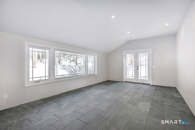 102 Wykeham Road Washington, CT 06793 - Photo 19 of 21 an empty room with windows