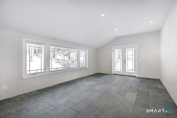 an empty room with windows