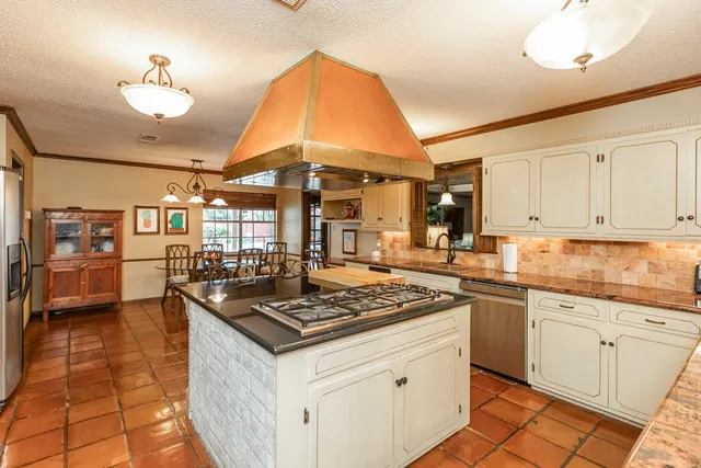 a bathroom with a toilet a sink and a mirror