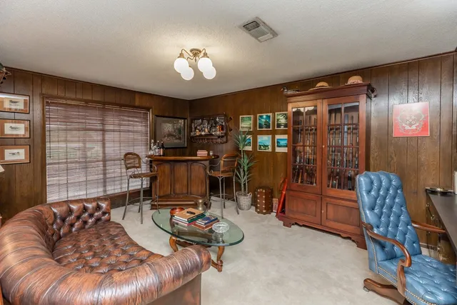a kitchen with stainless steel appliances a sink and cabinets