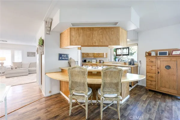 a kitchen with a sink and a window