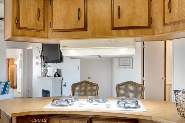 a kitchen with a sink cabinets and window
