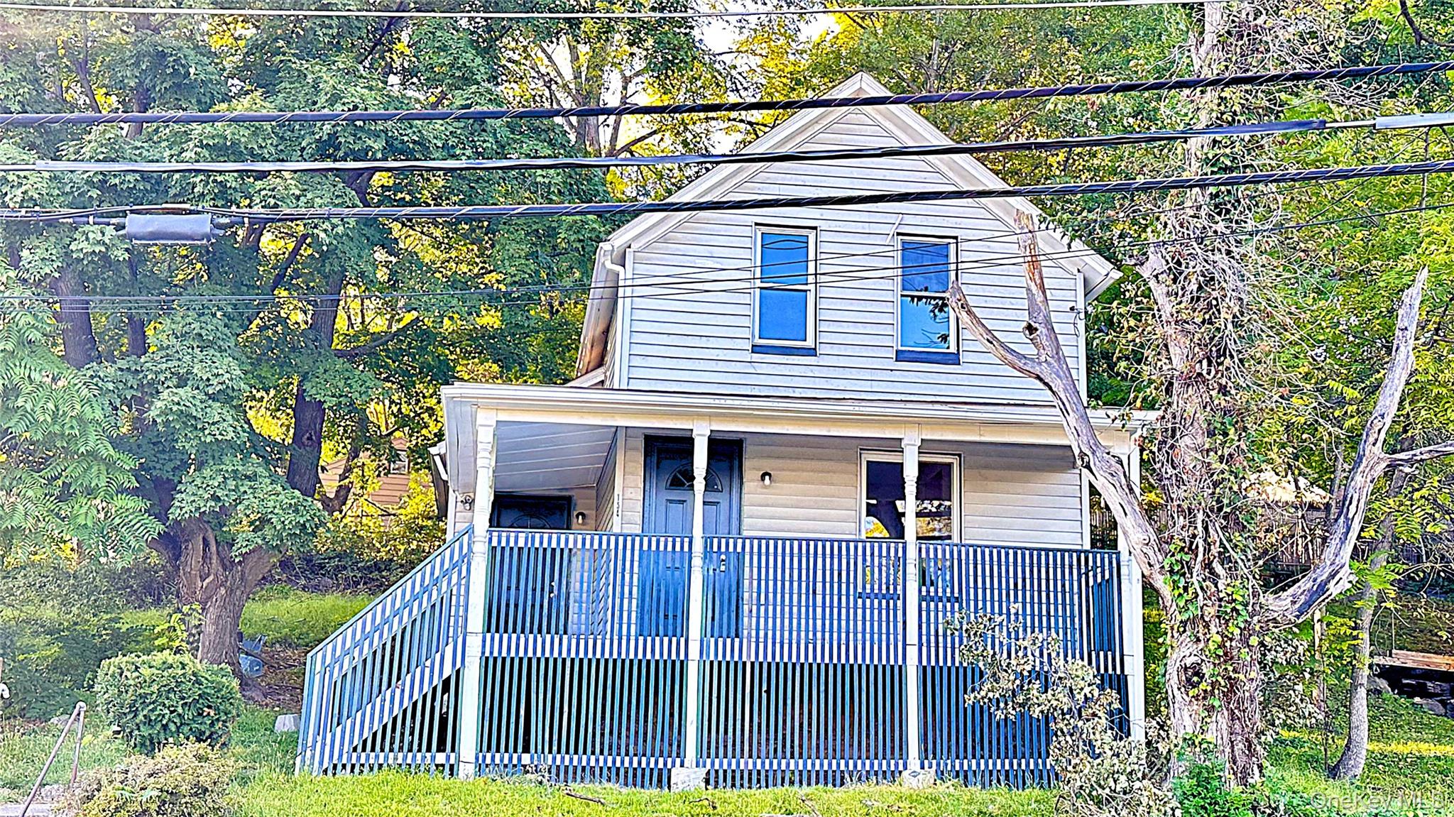154 Smith Street Poughkeepsie, NY 12601 - Photo 1 of 13 a view of a house with wooden fence