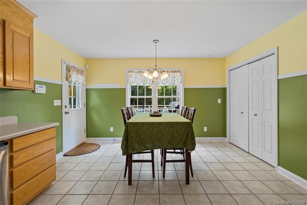 3127 Bush Road Clover, SC 29710 - Photo 22 of 47 a view of a dining room with furniture window and outside view