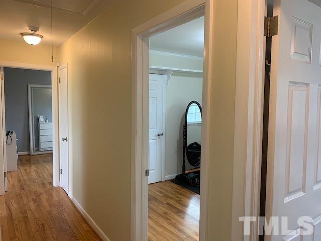 8609 Cassam Road Bahama, NC 27503 - Photo 19 of 23 a view of bedroom with wooden floor