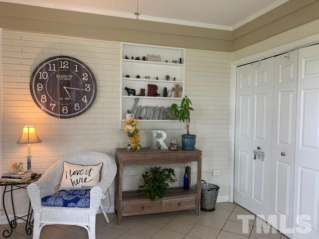 8609 Cassam Road Bahama, NC 27503 - Photo 20 of 23 a living room with furniture and a table